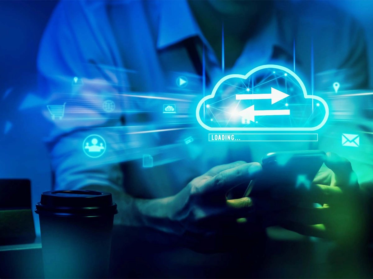 Abstract blue and green person shopping on a mobile device  with cloud shopping icons overlay