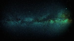 Image of stars and galaxy, black and green colors