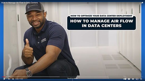 Image of data center technician monitoring a customer’s deployment performance.