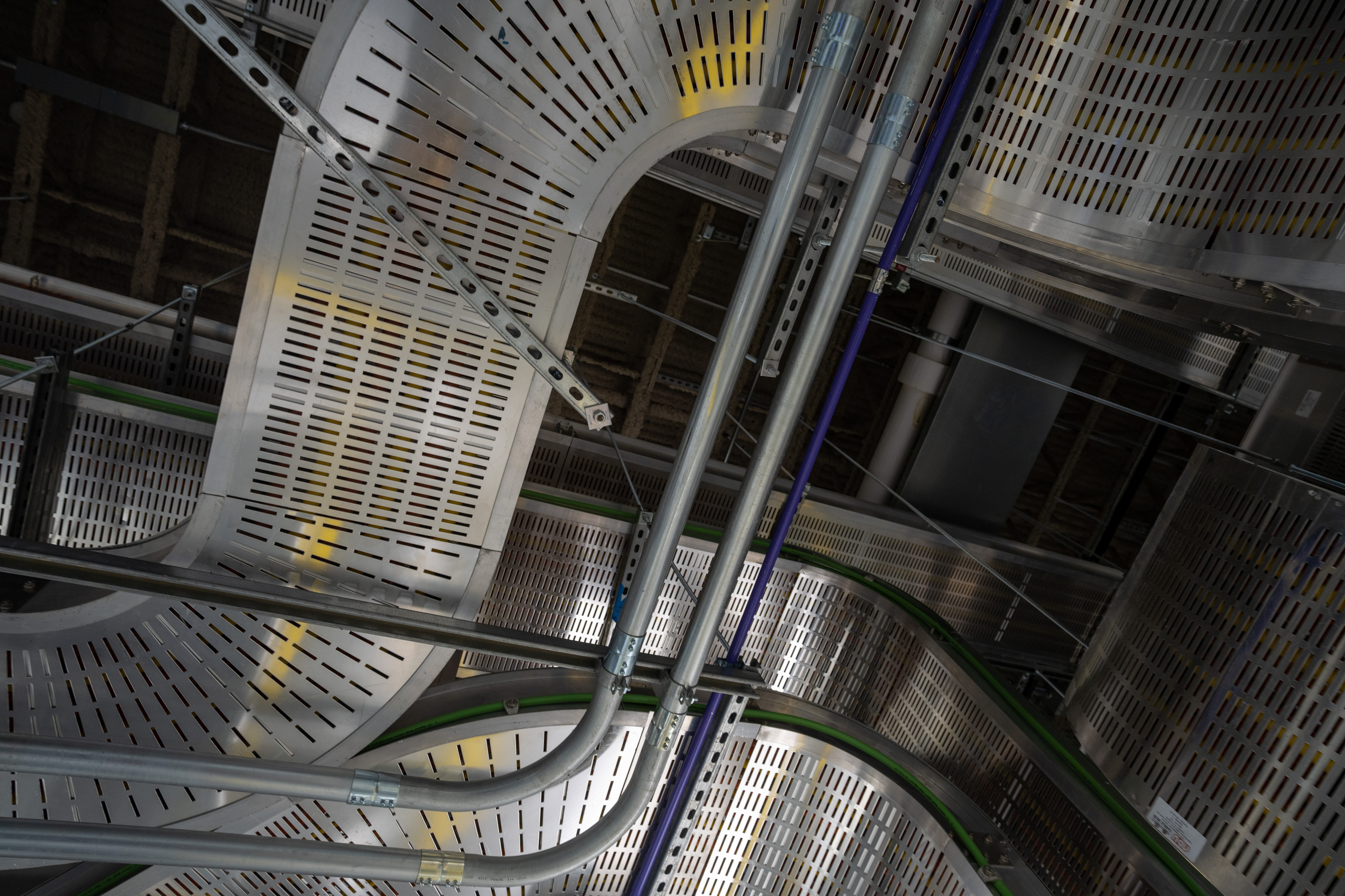 A photograph of cooling ducts and plenum in a data center.