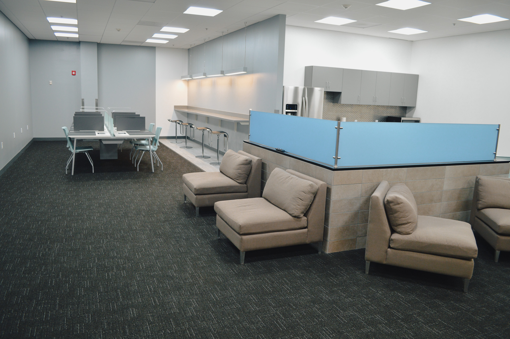 A photograph of a break room or lounge in a data center.